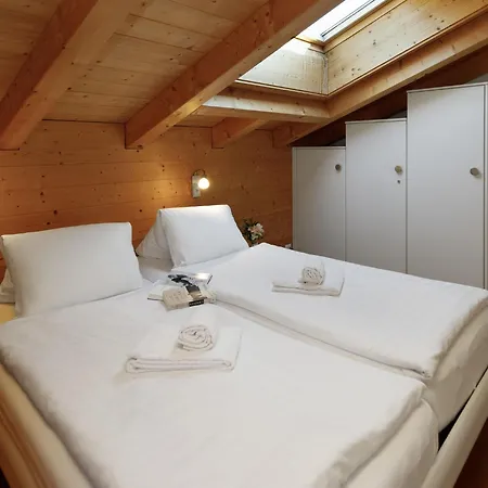Apartment Chalet Almisgaessli By Interhome